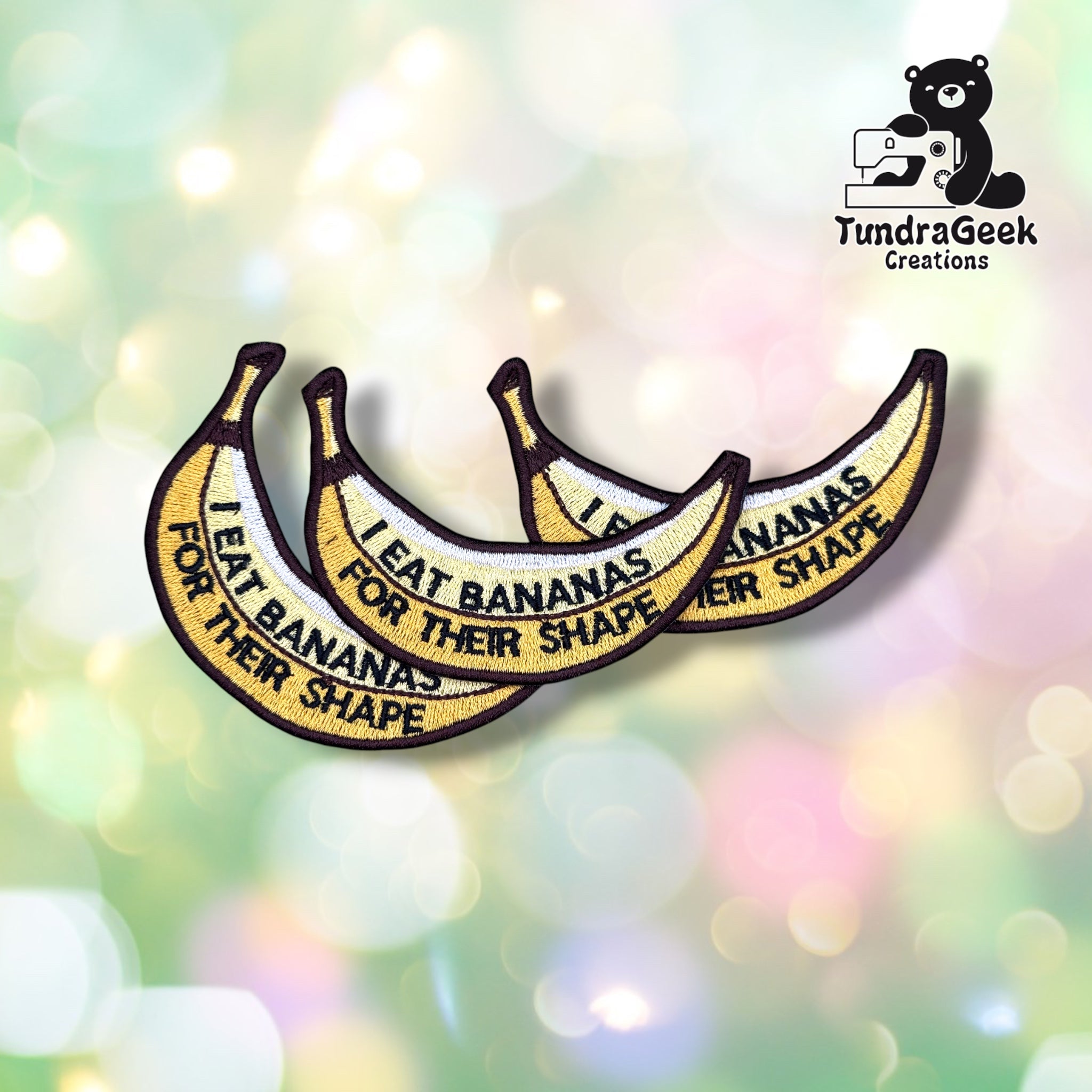 Three Banana Shape patches fanned out together, each showing the same yellow banana design with the "I EAT BANANAS FOR THEIR SHAPE" text.
