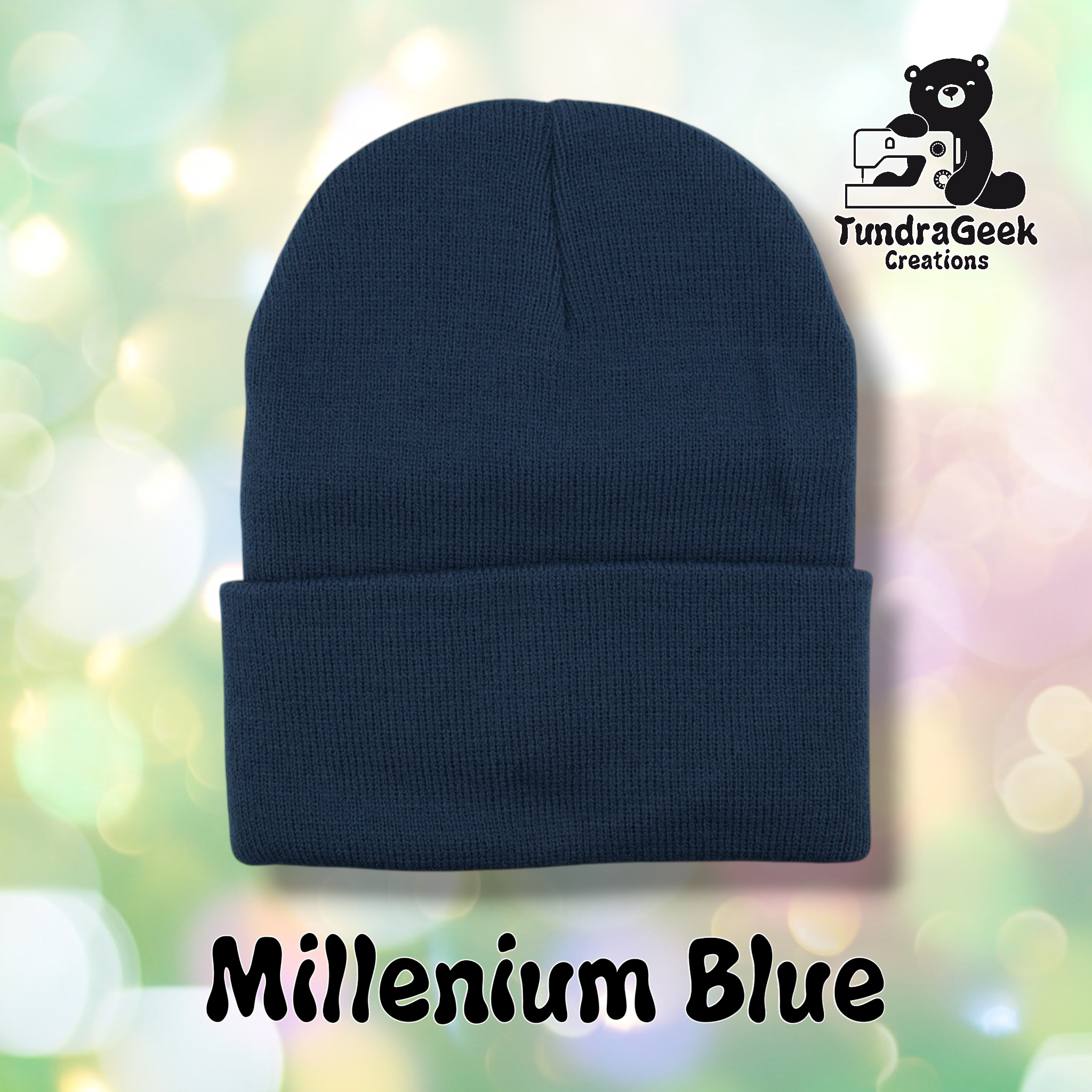 Plain dark navy/Millennium Blue cuffed beanie on a pastel bokeh background. Text reads "Millenium Blue" at the bottom of the image.