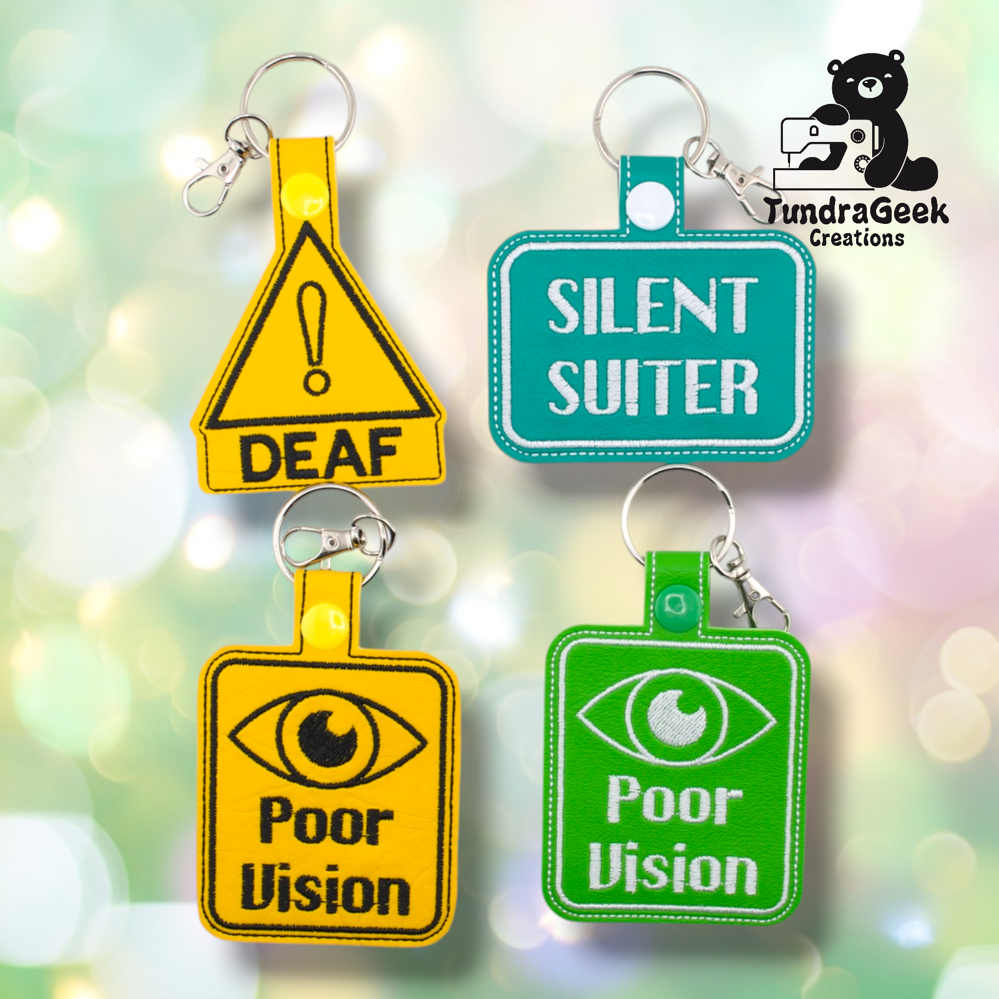 Four embroidered keychains are shown, labeled DEAF, SILENT SUITER, and Poor Vision in yellow and green, with a sewing-themed logo in the top right corner.