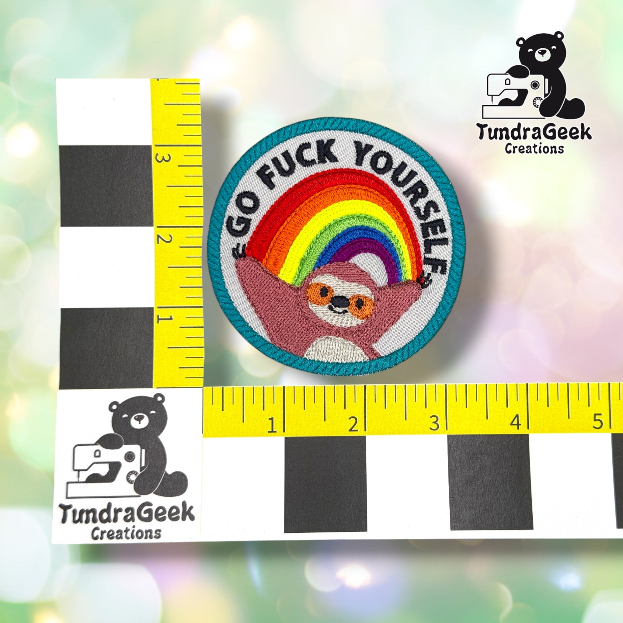 Patch measured against a yellow tailor's tape, confirming approximately 3.5 inches in diameter.  ---