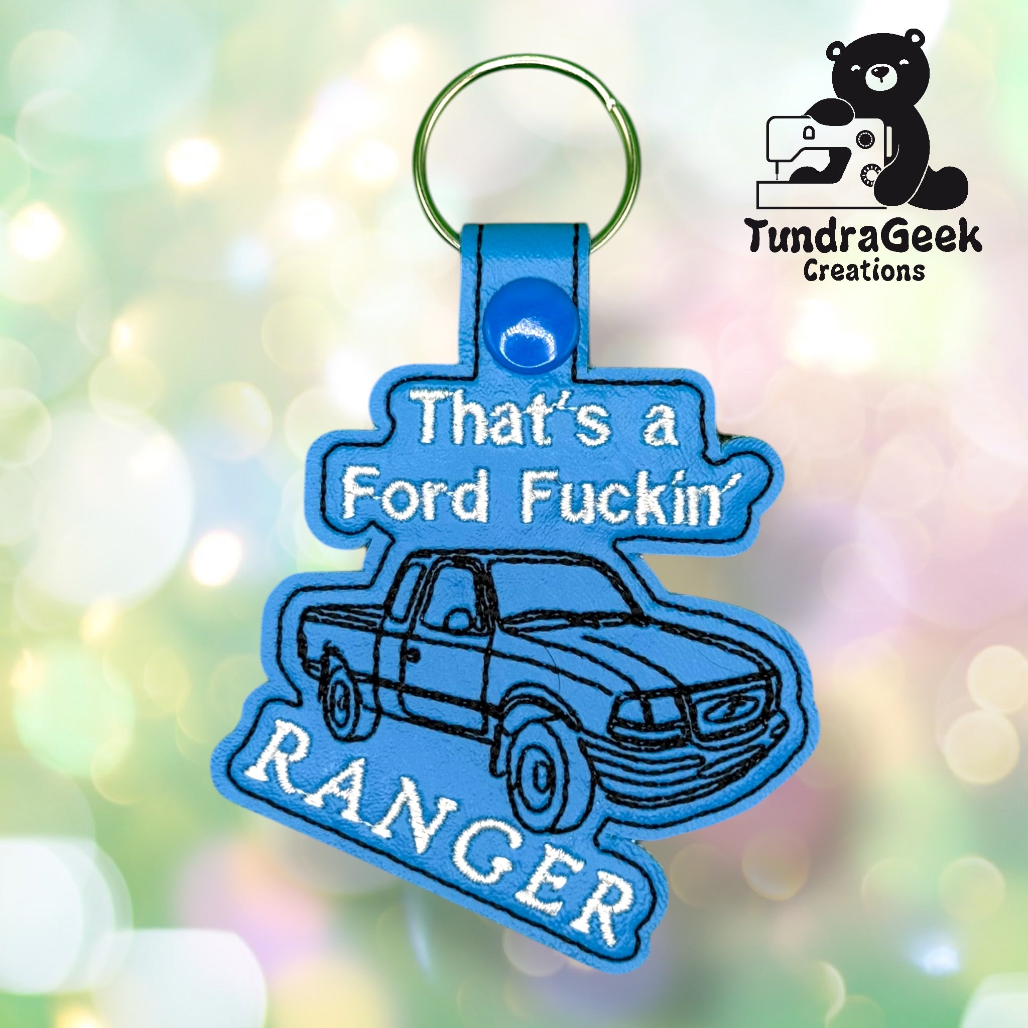 Blue keychain with an outline of a pickup truck and the text Thats a Ford Fuckin Ranger. TundraGeek Creations logo is in the upper right corner.
