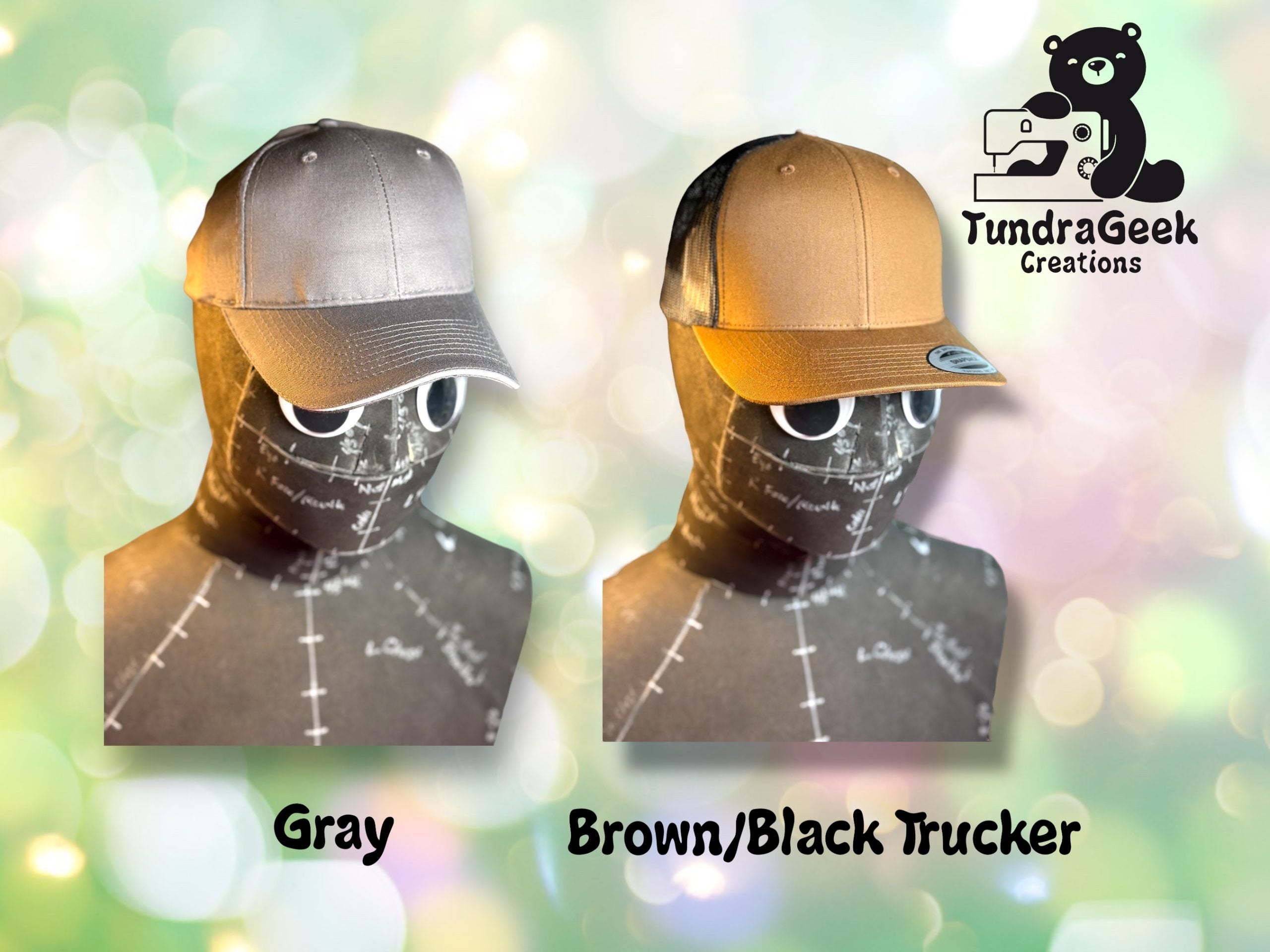 Two mannequin heads display hats: one gray baseball cap on the left and one brown and black trucker cap on the right. TundraGeek Creations logo is in the top right corner.