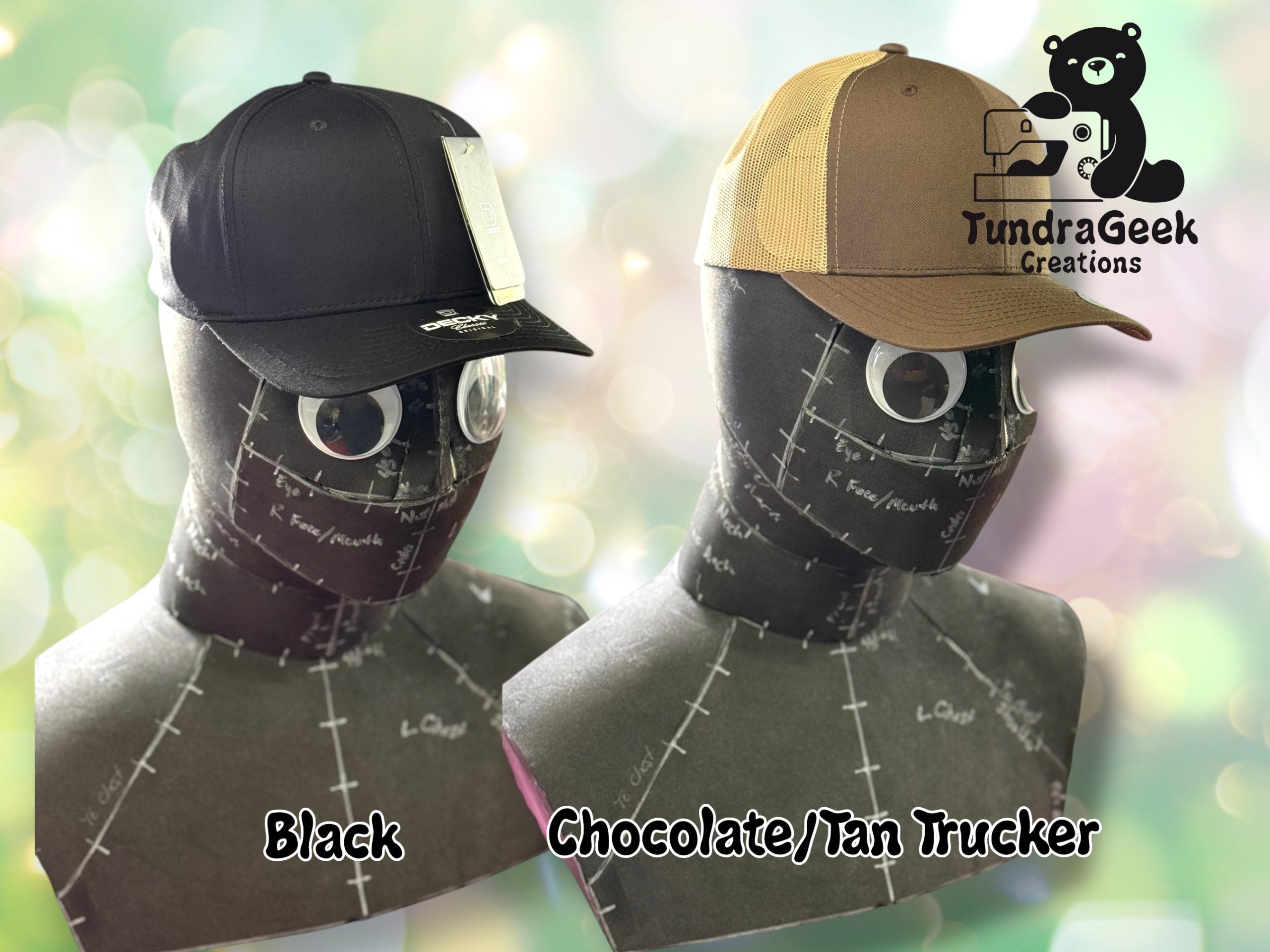 Two mannequin heads display baseball caps; one black, one brown and tan. Text reads Black and Chocolate/Tan Trucker. TundraGeek Creations logo appears in the upper right.