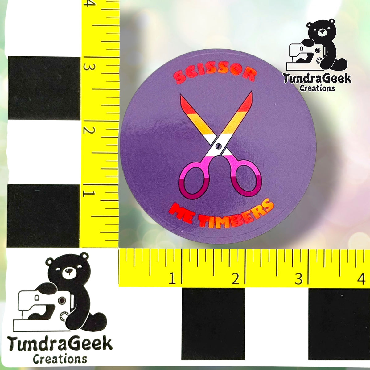 Lavender colorway sticker measured against a ruler, confirming approximately 3in diameter for the design area, not including the easy-peel edge. This photo is the closest true representation of the lavender background color.