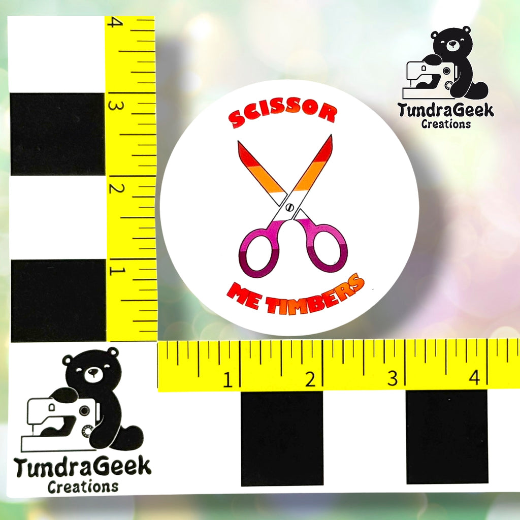 White colorway sticker measured against a ruler, confirming approximately 3in diameter for the design area, not including the easy-peel edge.