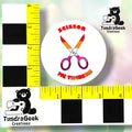 White colorway sticker measured against a ruler, confirming approximately 3in diameter for the design area, not including the easy-peel edge.