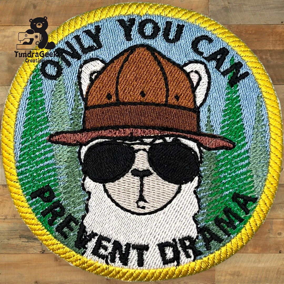 Embroidered patch showing a llama wearing sunglasses and a hat, with the text ONLY YOU CAN PREVENT DRAMA on a circular background.