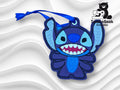 Blue embroidered keychain of Stitch from Disney’s Lilo & Stitch with a blue ribbon, displayed on a wavy white background with the TurtleaGeek Creations logo in the corner.