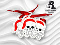 Three skull and crossbones ornaments wearing Santa hats with red ribbons, displayed on a wavy white background with the TundraGeek Creations logo in the top right corner.