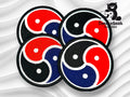 Four round embroidered patches with a tricolor yin-yang design in red, blue, and black are displayed on a wavy white background with a TundraGeek Creations logo in the corner.