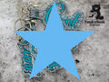 Several keychains with embroidered text are arranged on a gray surface. The TundraGeek Creations logo appears in the top right corner. A large blue star covers part of the image.