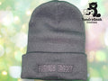 A gray knit beanie with FURIOUS FAGGOT embroidered on the folded brim; a TundraGeek Creations logo is visible in the top right corner.