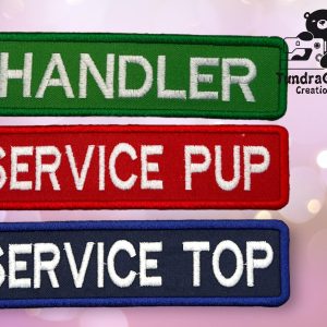 Picture of patches that have "HANDLER" "SERVICE PUP and "SERVICE TOP" embroidered on them